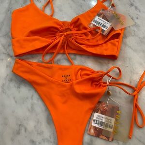 Bought from Oh Polly Neena Swim. Size Small Top. Size XS bottoms. Bright orange